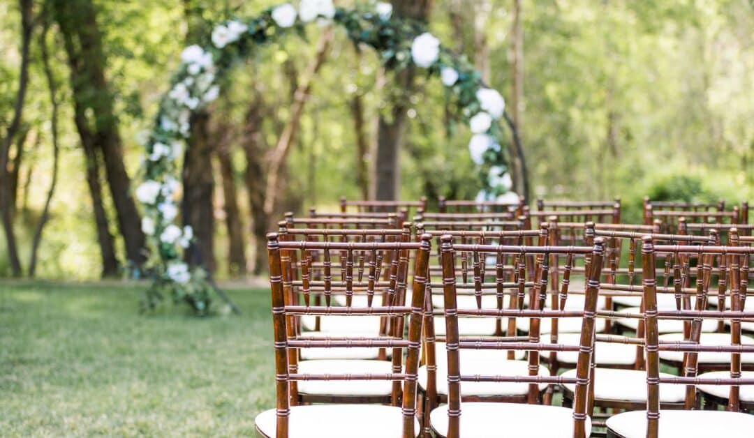 Chairs set up for an outdoor wedding